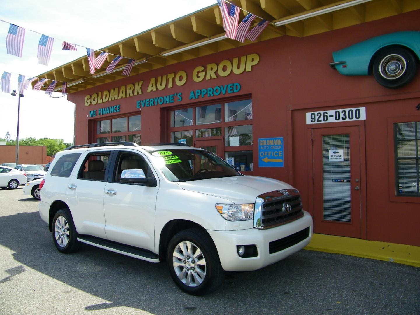 2015 White /Brown Toyota Sequoia Plantium 4WD FFV (5TDDW5G19FS) with an 5.7L V8 DOHC 32V FFV engine, 6-Speed Automatic transmission, located at 4000 Bee Ridge Road, Sarasota, FL, 34233, (941) 926-0300, 27.298664, -82.489151 - Photo#1